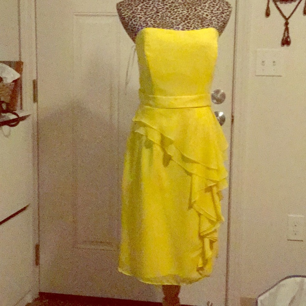 NWOT yellow strapless peplum style dress